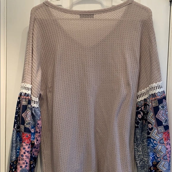 Tan shirt multi color sleeve. Good condition. - Picture 4 of 5